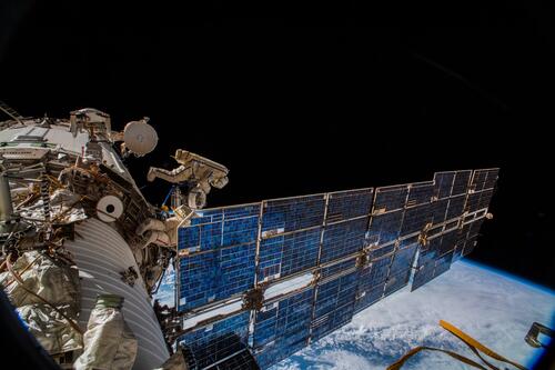 The cosmonauts Oleg Artemyev and Sergey Prokopyev installing an antenna on the International Space Station in 2018 to track animal movements on Earth.Credit...A. Gerst/ESA/NASA